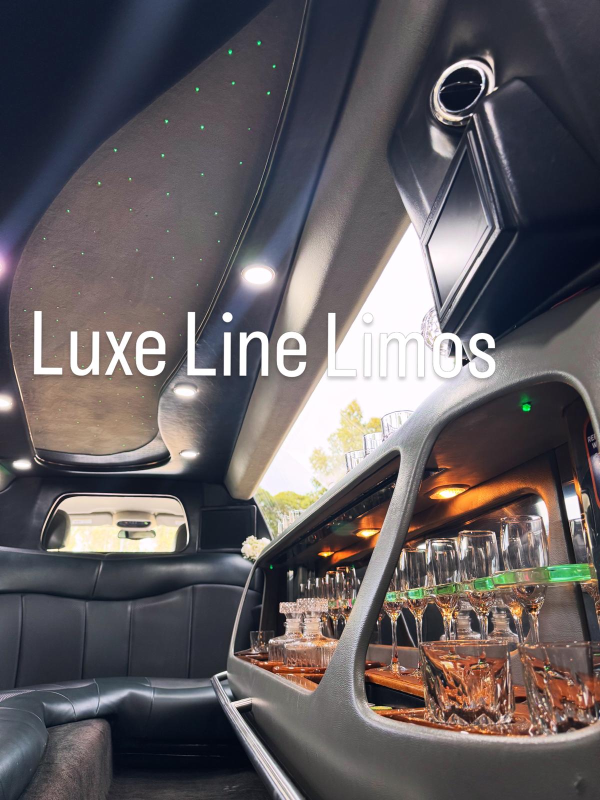 Luxe Line Limos limousine interior with starlight ceiling, ambient lighting and champagne bar